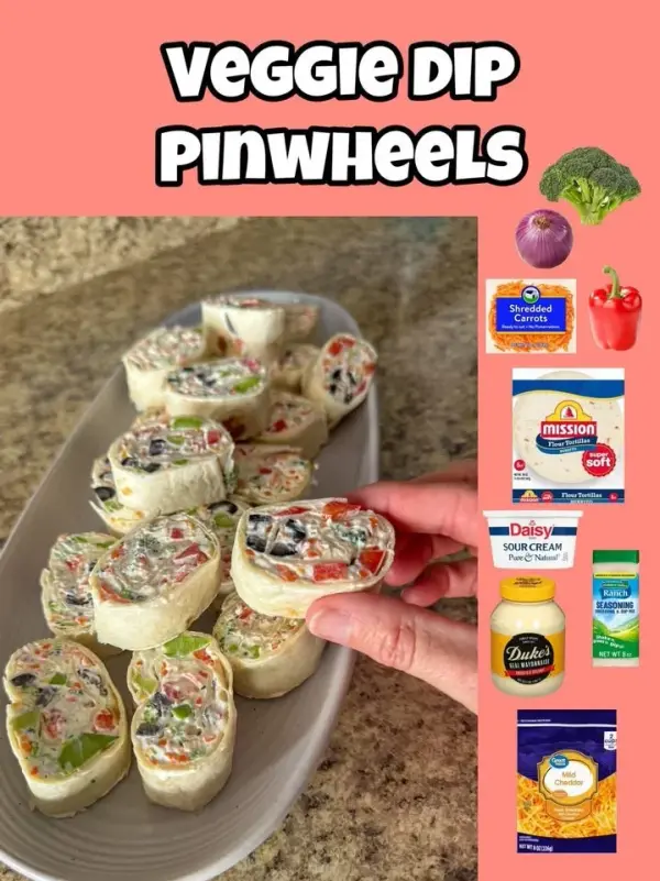 Veggie dip pinwheels garnished with colorful vegetables and herbs