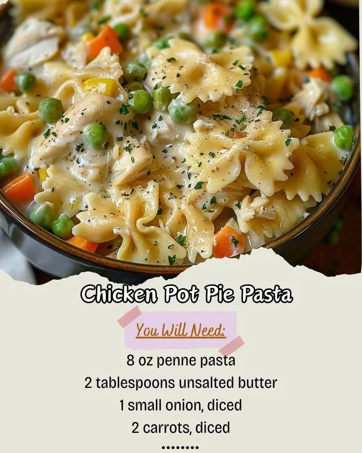 A creamy Chicken Pot Pie Pasta served in a bowl with herbs and vegetables.