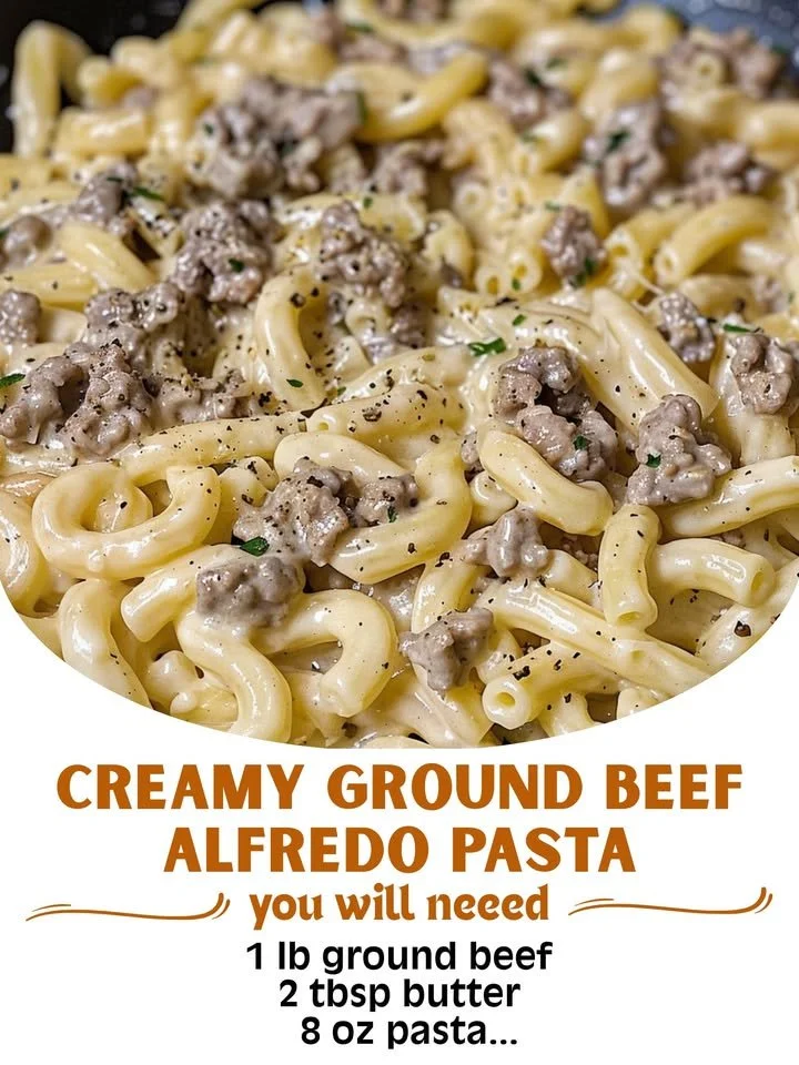 Creamy ground beef Alfredo pasta topped with parsley on a plate.