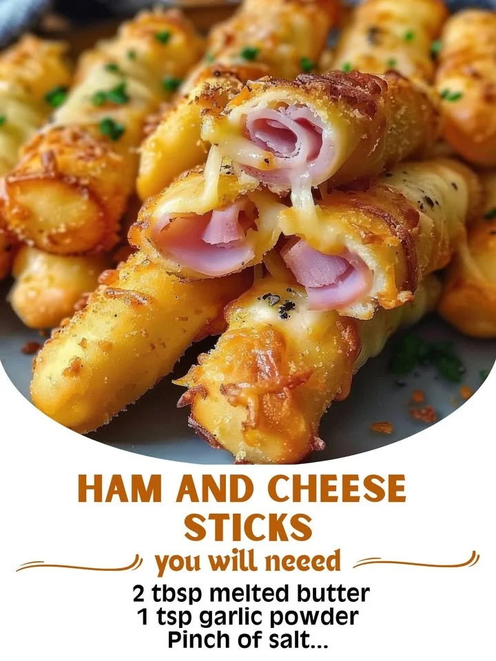 Ham and cheese sticks served on a platter with dipping sauce.