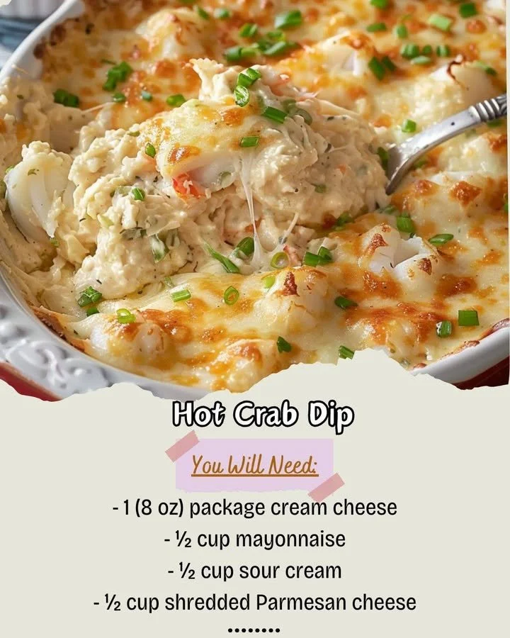 Delicious hot crab dip served in a bowl, ready for dipping with crackers.