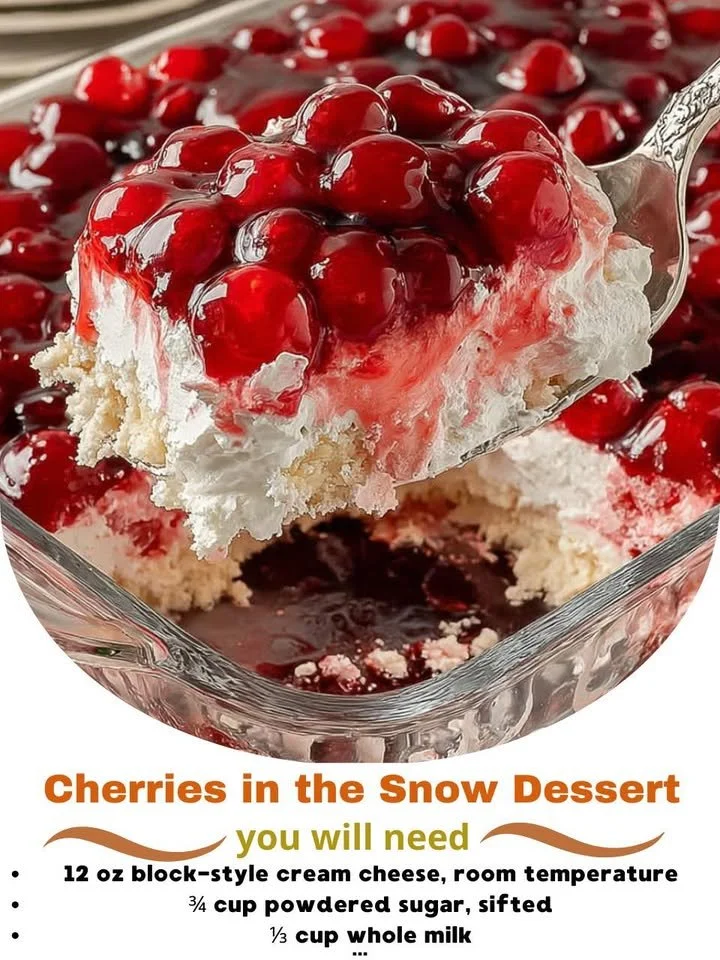 Cherries in the Snow dessert featuring creamy layers and fresh cherries
