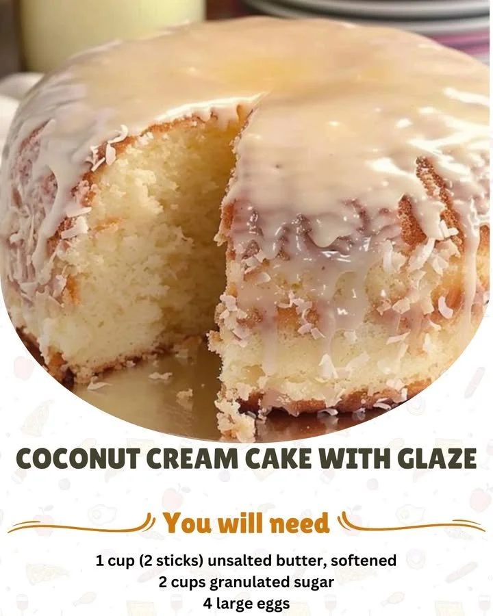 Delicious Coconut Cream Cake with Glaze topped with coconut flakes