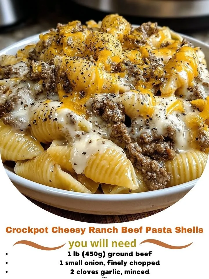 Crockpot Cheesy Ranch Beef Pasta Shells served in a bowl garnished with herbs
