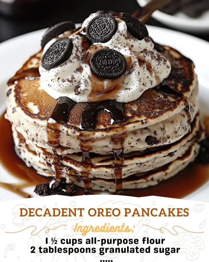 Fluffy Oreo pancakes topped with chocolate syrup and crushed Oreo cookies