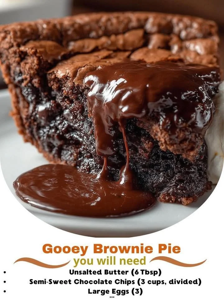 Decadent gooey brownie pie topped with chocolate drizzle and walnuts