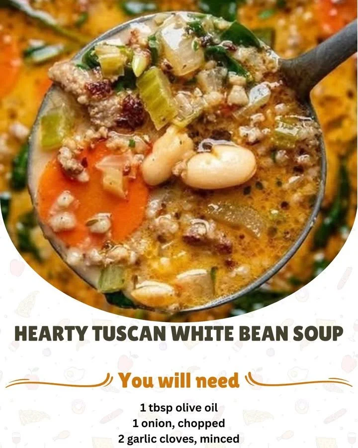 A bowl of hearty Tuscan White Bean Soup garnished with herbs and olive oil