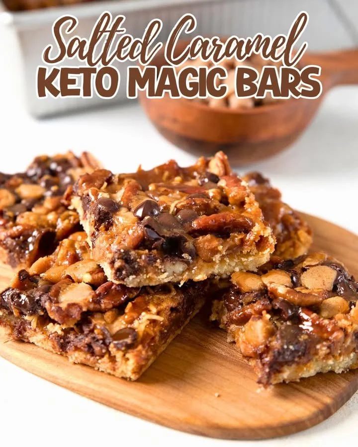 Keto Salted Caramel Magic Cookie Bars on a rustic wooden table