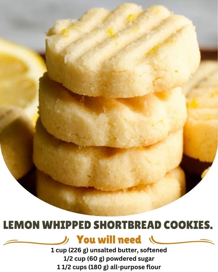 Lemon whipped shortbread cookies on a plate with lemon zest garnish