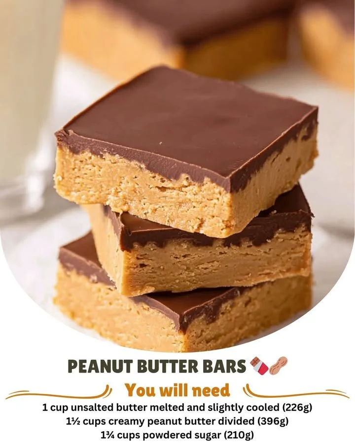 Homemade peanut butter bars topped with chocolate and nuts