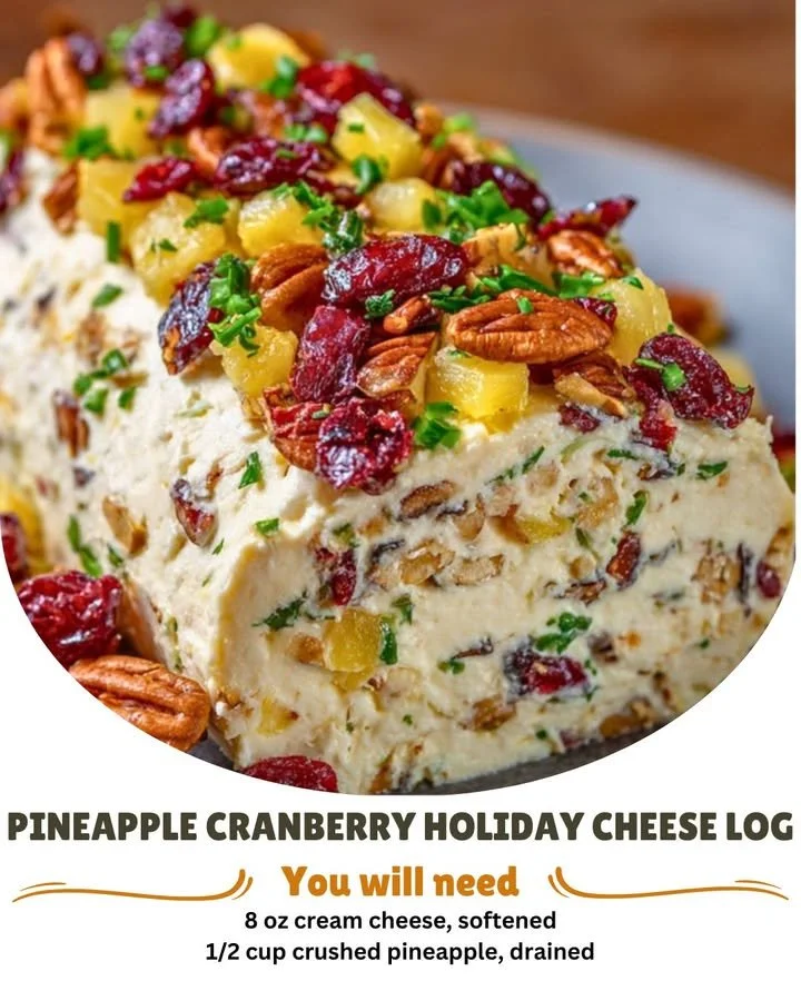 Pineapple Cranberry Holiday Cheese Log served on a wooden platter.