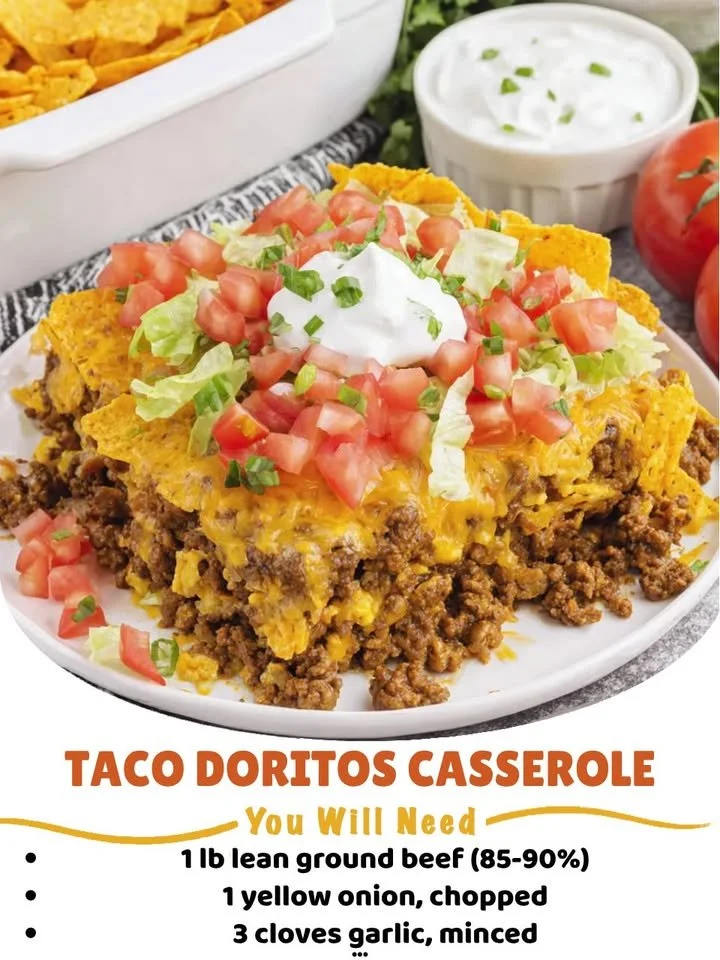 Delicious Taco Doritos Casserole topped with cheese and Doritos.