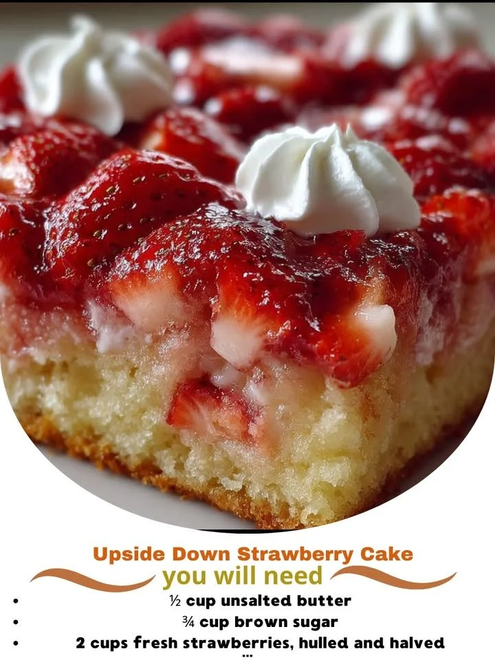 Slice of Upside Down Strawberry Cake topped with fresh strawberries