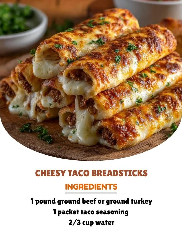 Cheesy taco breadsticks served with dipping sauce on a plate