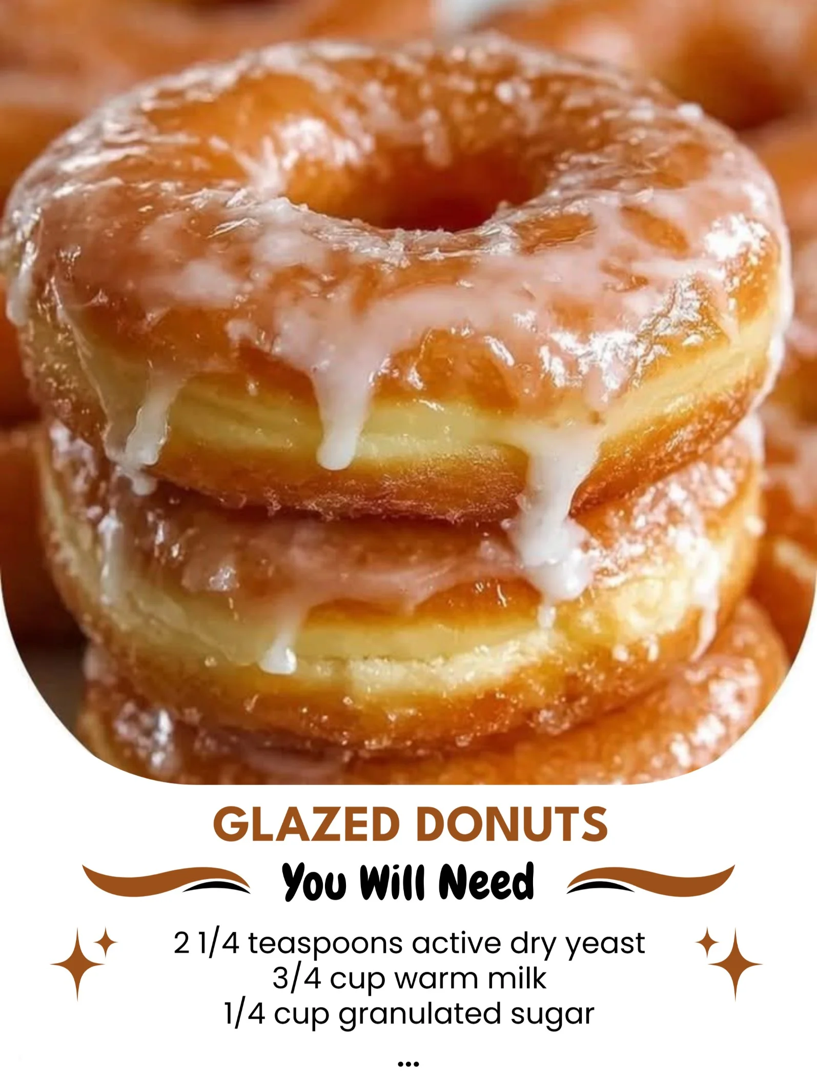 Freshly made glazed donuts with shiny frosting on display.