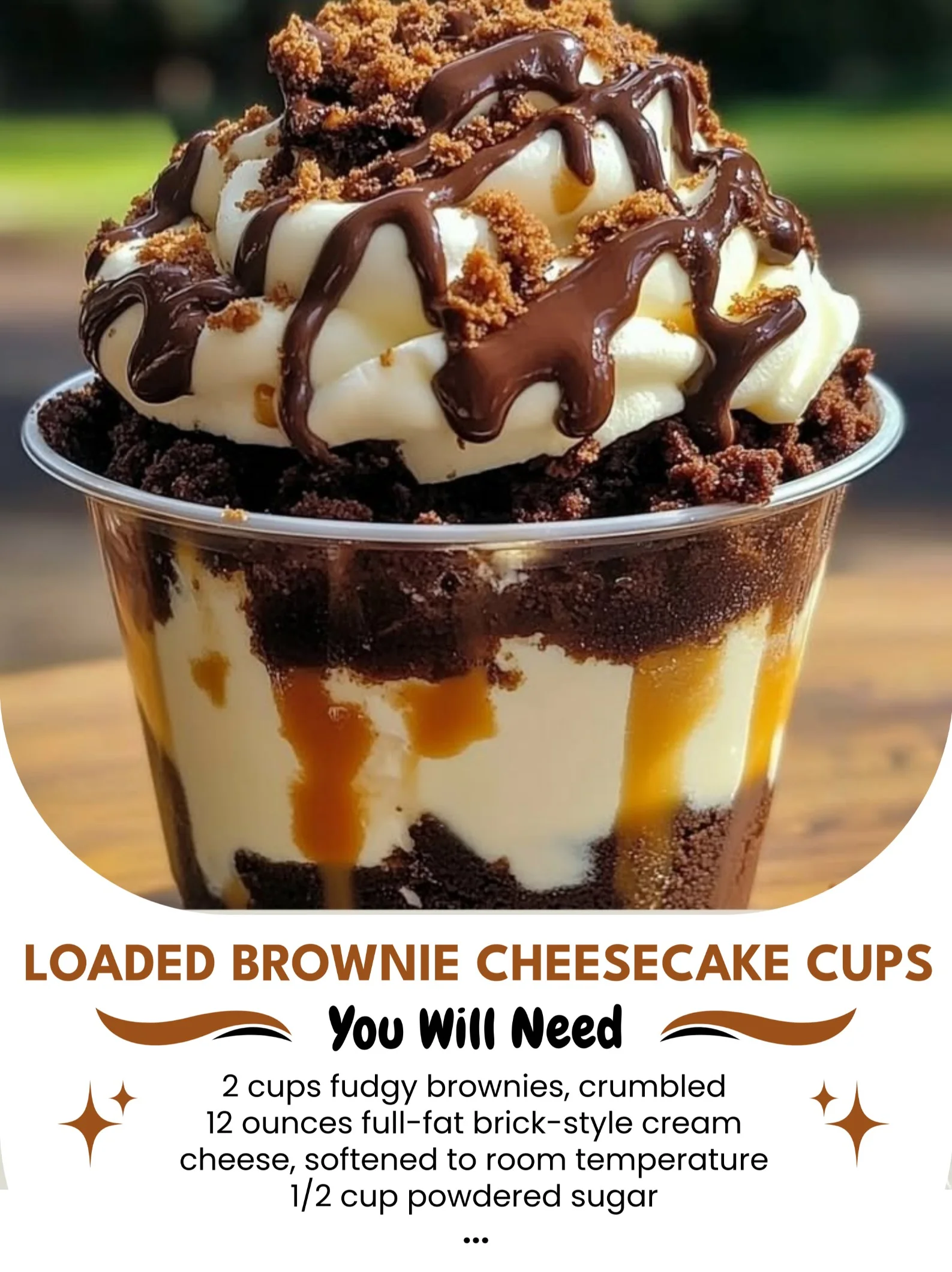 Loaded brownie cheesecake cups topped with chocolate and cream, a delicious dessert.