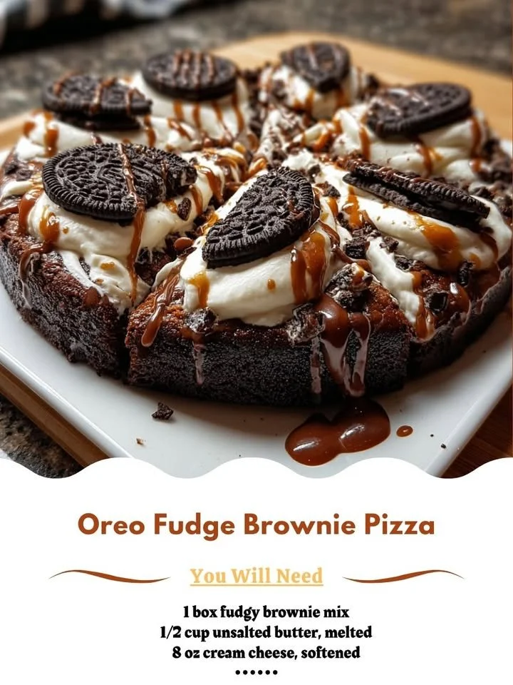Delicious Oreo Fudge Brownie Pizza topped with crushed Oreos and fudge
