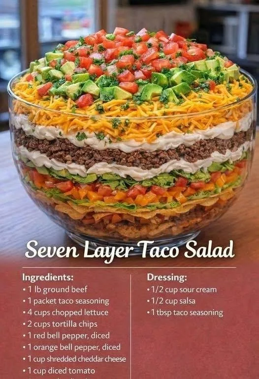 Colorful Seven Layer Taco Salad with fresh ingredients and toppings