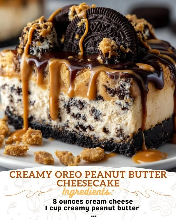 Slice of creamy Oreo Peanut Butter Cheesecake topped with Oreo cookies and peanut butter swirl.