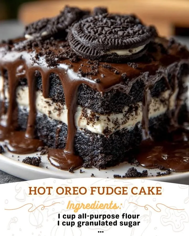 Decadent Hot Oreo Fudge Cake topped with creamy fudge and Oreo crumbs