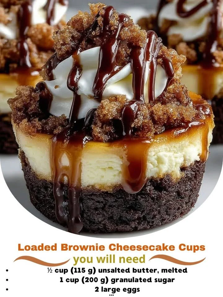 Delicious loaded brownie cheesecake cups topped with chocolate and whipped cream