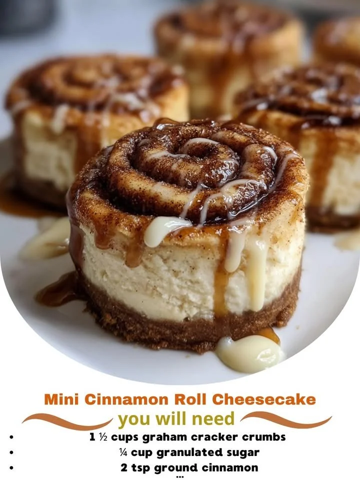 Mini cinnamon roll cheesecake bites on a plate, topped with icing and cinnamon.