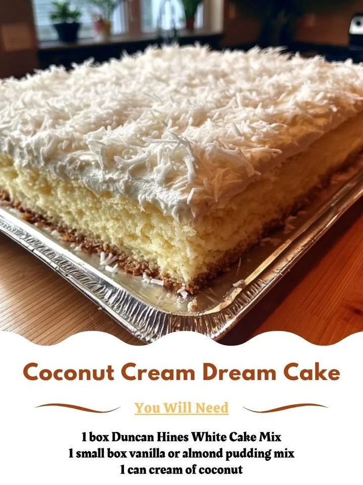 Slice of Coconut Cream Cake with whipped cream and coconut flakes.