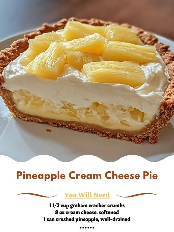 Slice of Pineapple Cream Cheese Pie on a plate with fresh pineapples