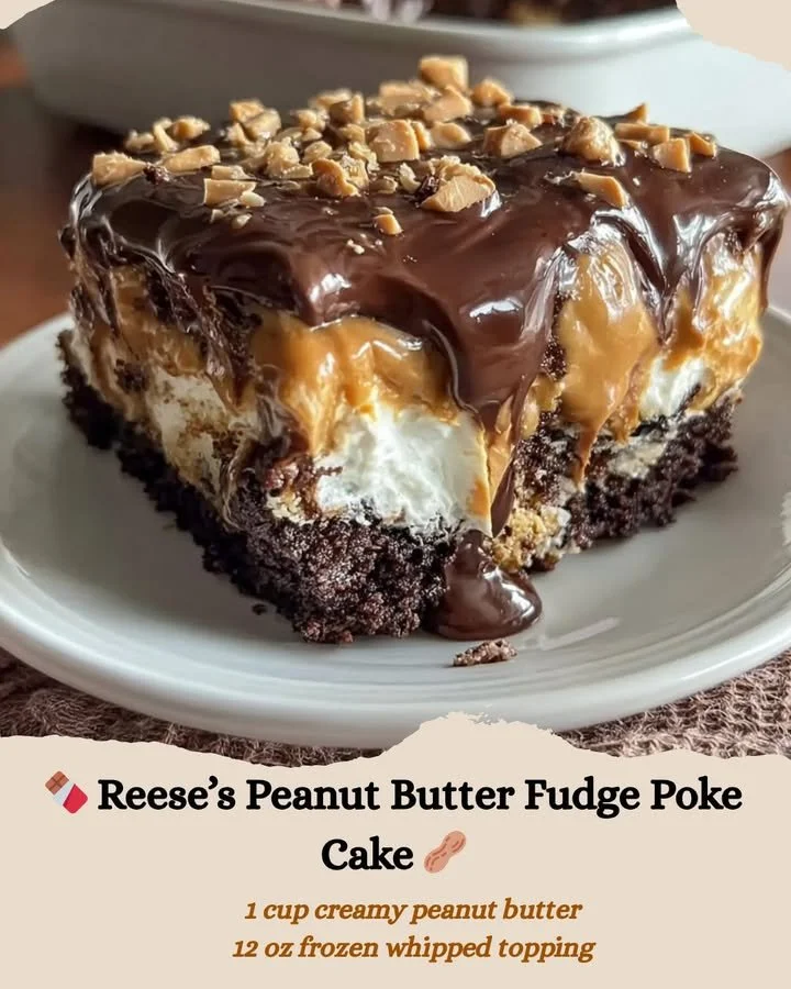 Reese’s Peanut Butter Fudge Poke Cake topped with creamy peanut butter frosting.
