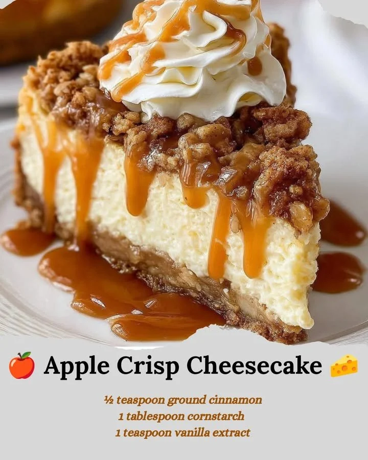 Slice of Apple Crisp Cheesecake topped with caramel and crumble