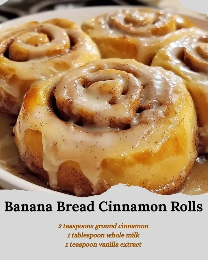 Freshly baked banana bread cinnamon rolls topped with creamy icing