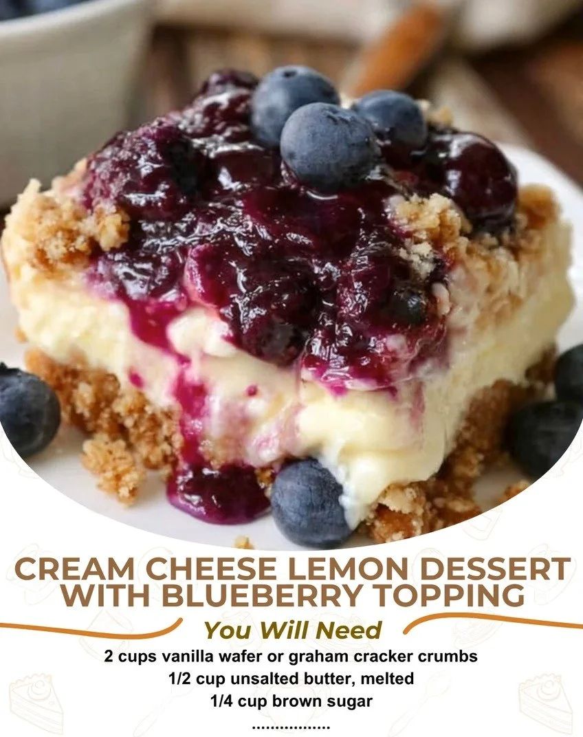 Blueberry-topped lemon cream cheese dessert served in a glass dish