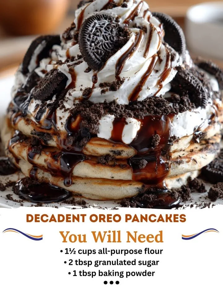 Delicious stack of fluffy Oreo pancakes topped with cream and cookies