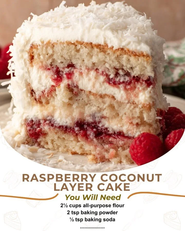 Beautiful Raspberry Coconut Layer Cake with creamy frosting and fresh raspberries