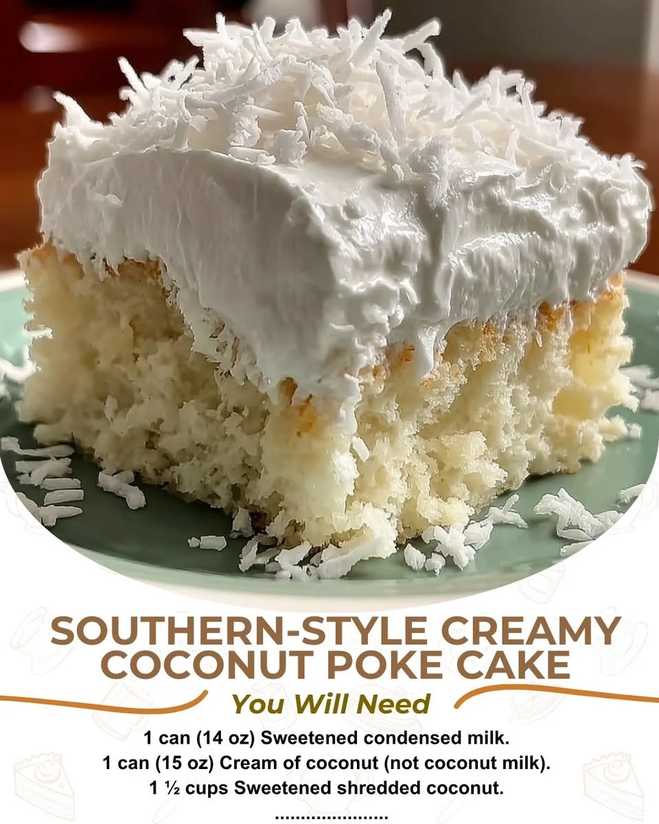 Southern-style creamy coconut poke cake topped with coconut flakes and whipped cream.