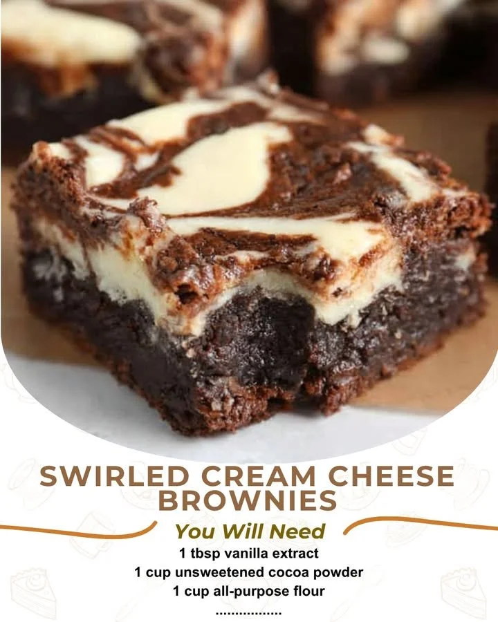 Swirled cream cheese brownies topped with chocolate and cream cheese swirl