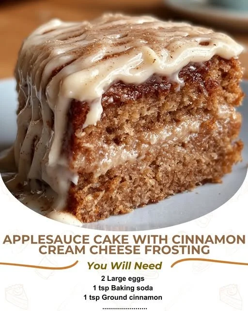 Delicious homemade Applesauce Cake topped with icing and fresh ingredients.