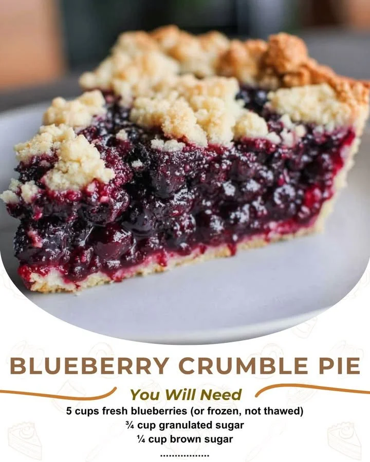 Blueberry pie with a crumble topping served on a plate