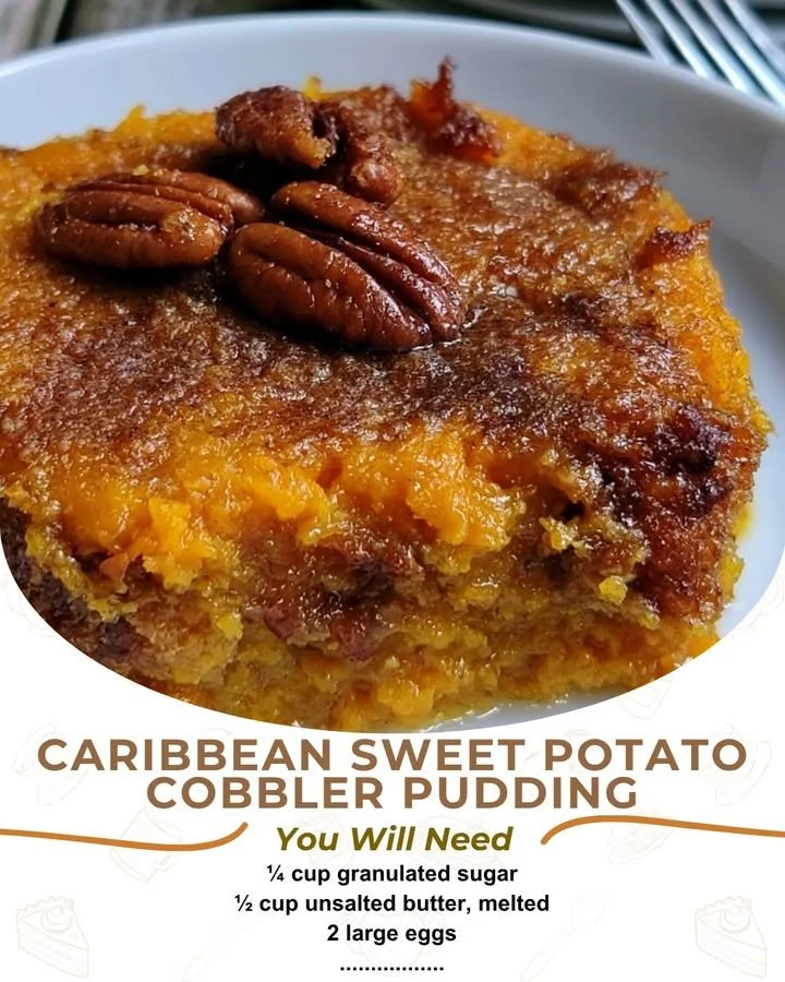 A slice of Caribbean sweet potato cobbler pudding on a plate with a decorative garnish.