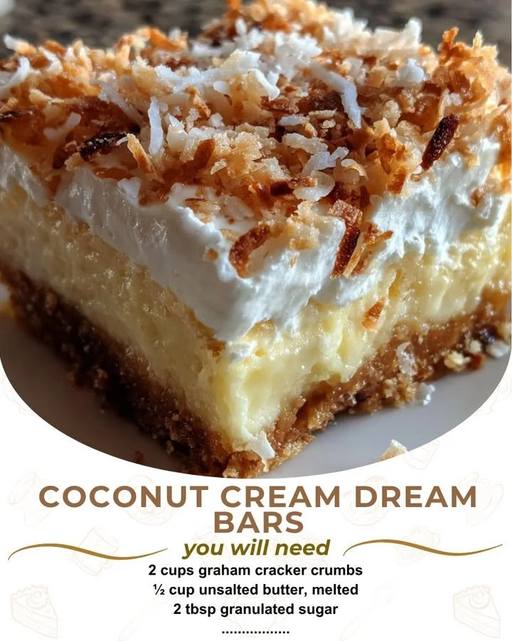 Delicious coconut cream dream bars topped with coconut flakes and cream