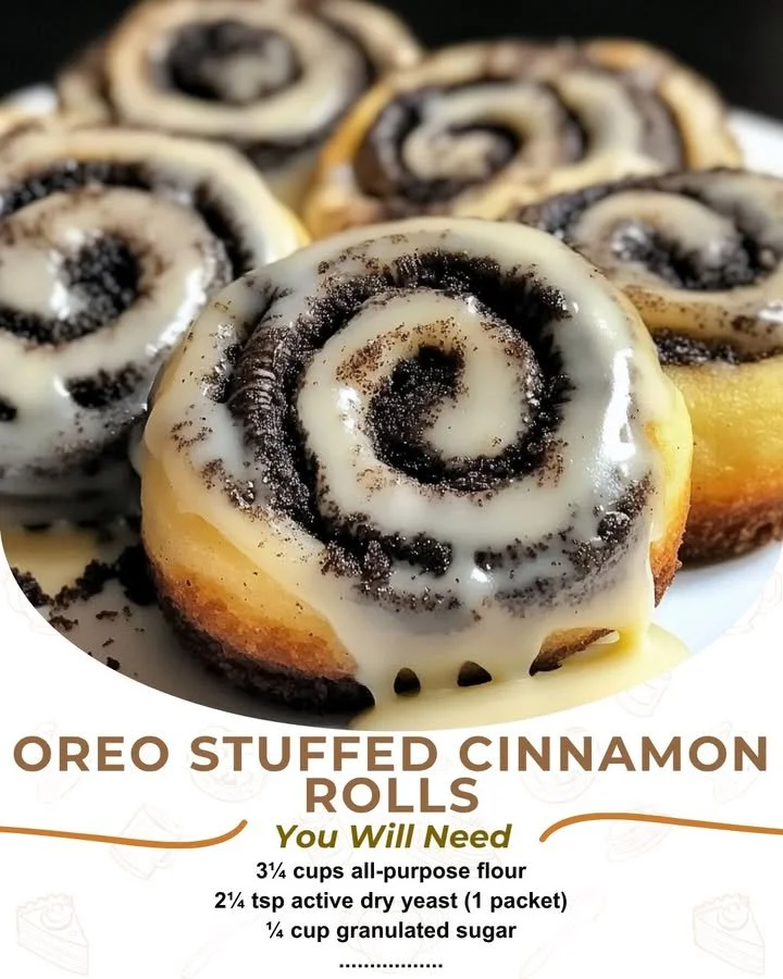 Oreo cheesecake cinnamon rolls topped with crushed Oreos and creamy frosting